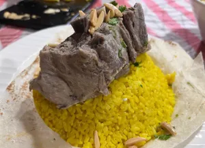 Lamb Mansaf With Rice And Jamed Sauce
